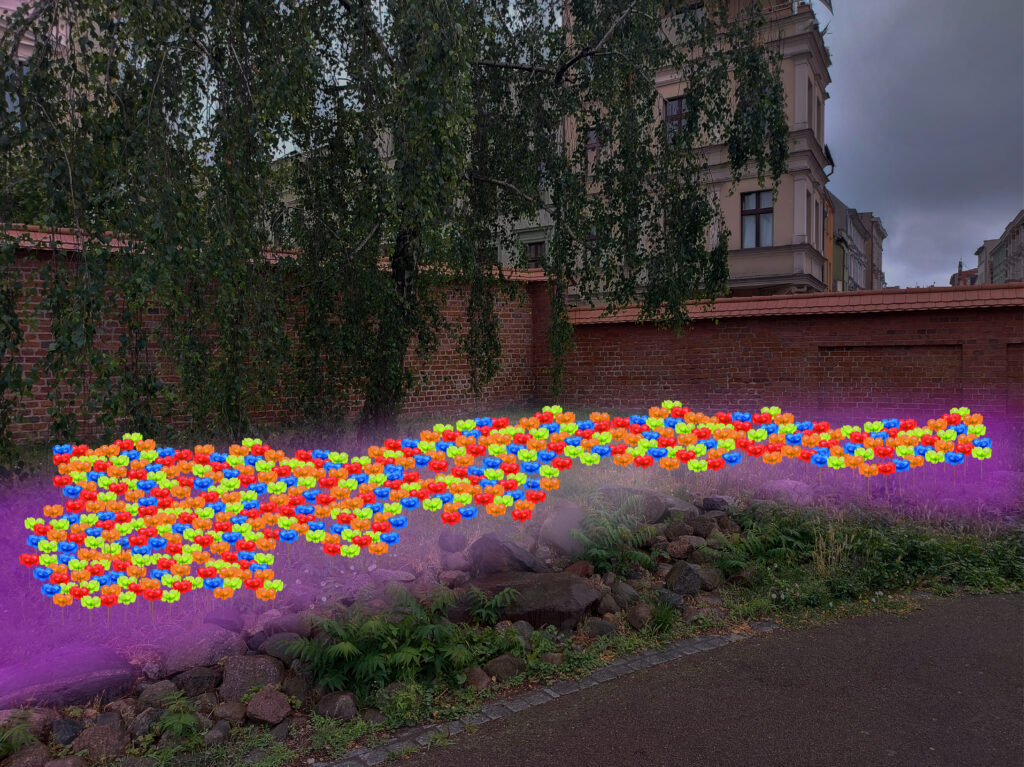 Zdjęcie przedstawia łąkę z kwiatów stworzonych plastikowych butelek.